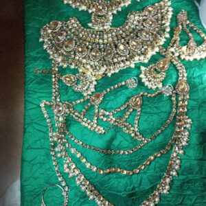 Gold bridal jewellery with gold stones and pearls