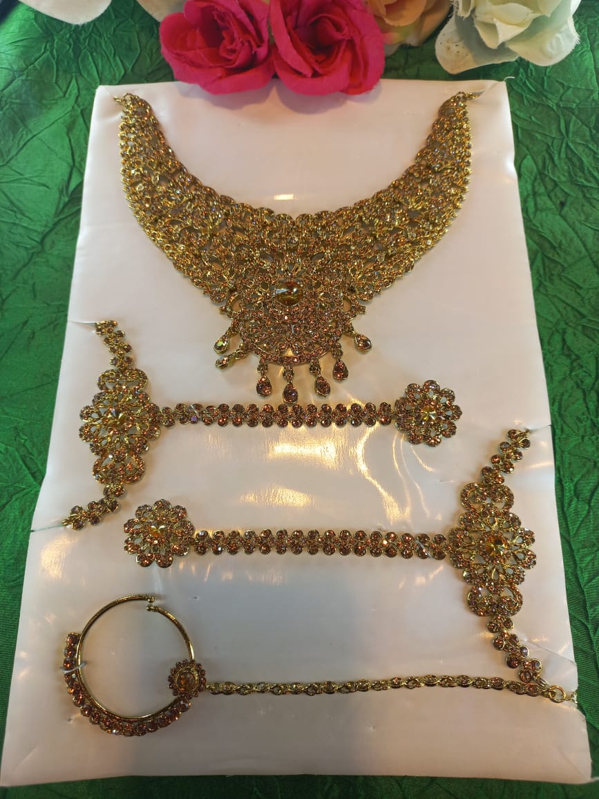 Gold-crystal-bridal-jewellery-sets.jpeg Gold crystal bridal jewellery set