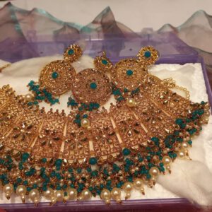Gold crystal set with green
