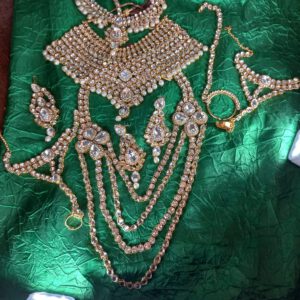Jodah Akbar kundan bridal jewellery gold with white stones