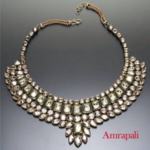 Kundan set with gold An white stones with earrings an bhindi